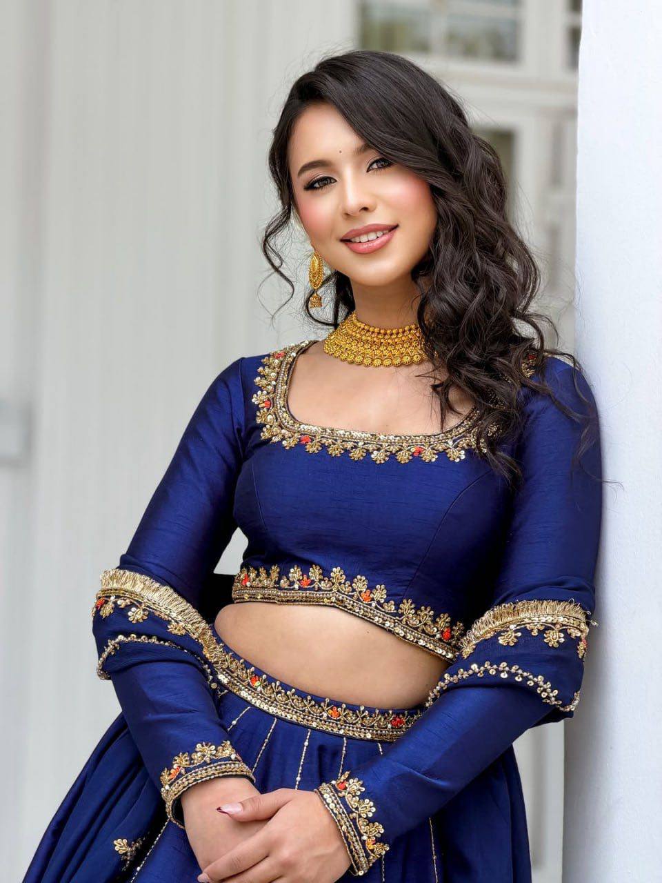 Radiant Rani Pink Silk Lehenga Choli Adorned with Opulent Heritage Floral Motifs and Intricate Zari Borders